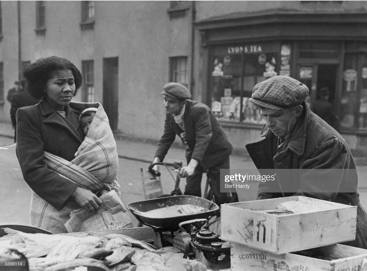 A street vendor in Bute Town, Cardiff, 1950.Photo by Bert Hardy