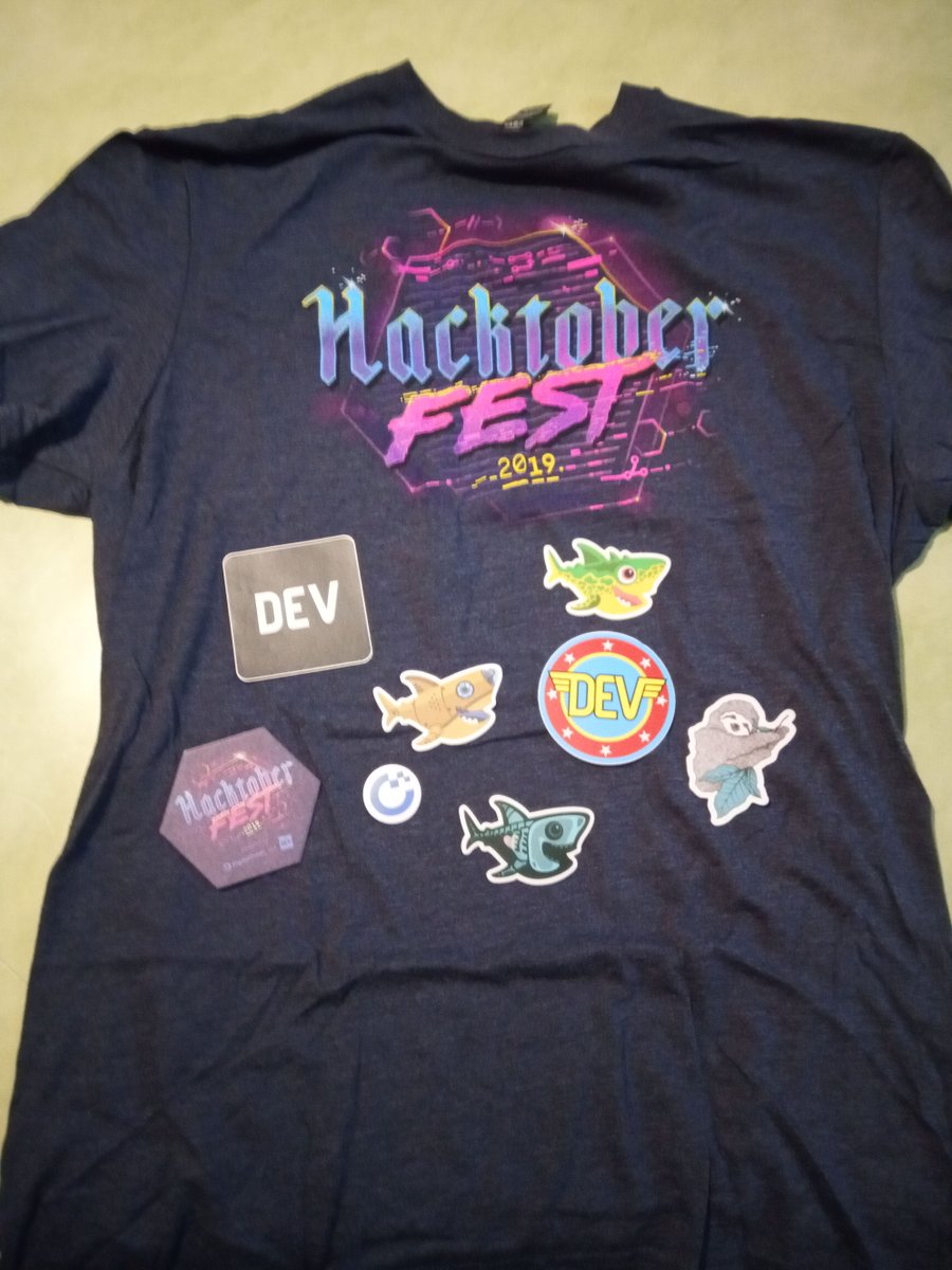 T-shirt and stickers earned during Hacktoberfest 2019.