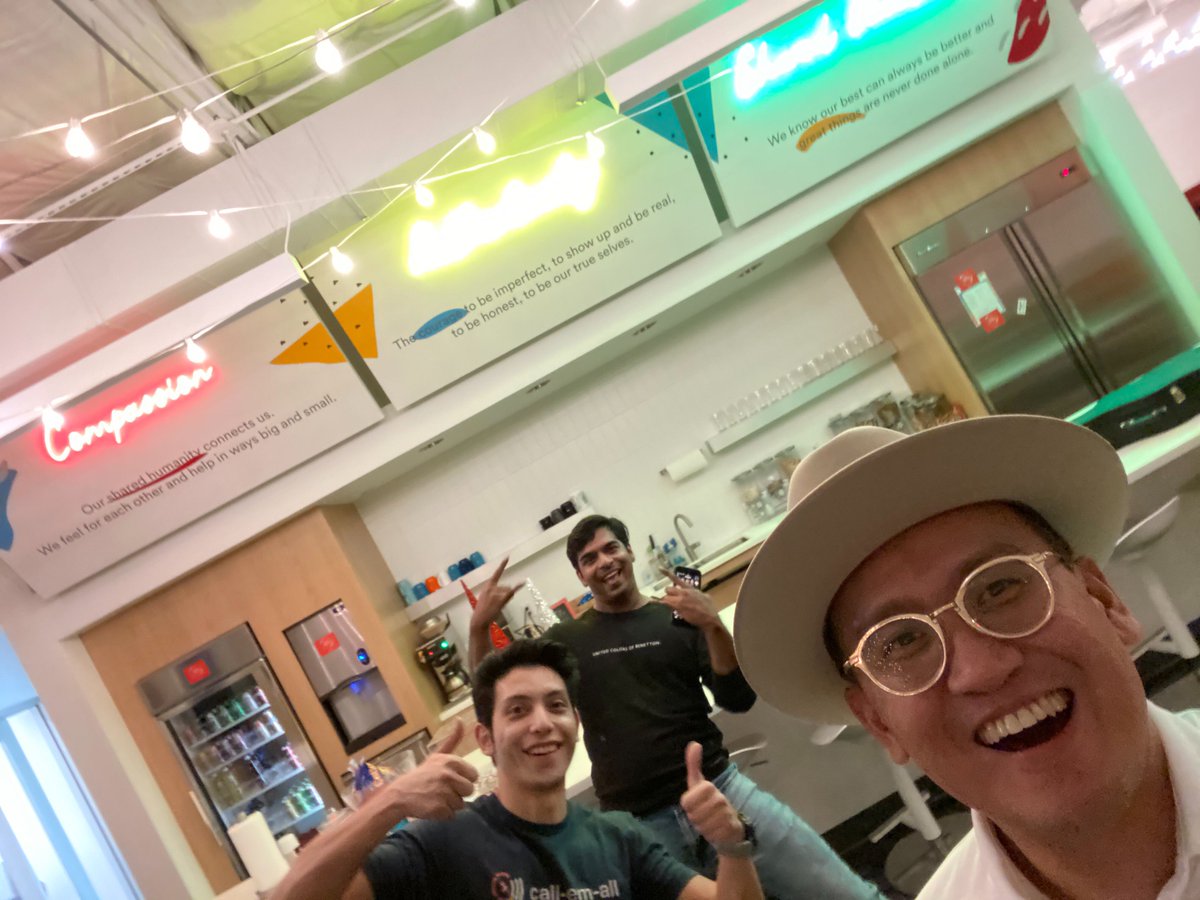 TextEmAll's tweet photo. Hai, Nitin, and Mo have been working hard adding the final touches to our office. We love the new neon signs that uniquely display our values. #compassion #authenticity #sharedexcellence https://t.co/PnVdQH6af1
