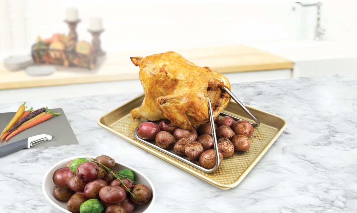 If you're tired of turkey, you're not alone. This year, use Tovolo's NEW Chicken Roasting Rack for the most decadent poultry of your life. The design encourages even heat distribution, tender and juicy meat, and crispy skin for a delicious dinner. #KitchenTools #Tovolo