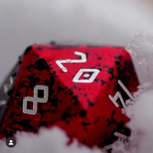 norsefoundry's tweet photo. What better way to get some holiday vibes going then to see Demons Blood Boulder in some snow! Thank you @heathendesigns for letting share your awesome picture! #dice #dnd #dungeonsanddragons #norsefoundry #d20 #metaldice #diceporn #dicecollection #dicec… https://t.co/BBDX5pJzBr https://t.co/hx7c0cyNgb