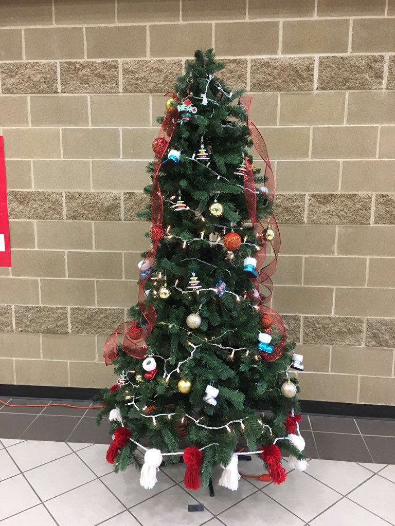 TX_MsMelton's tweet photo. I may be heading off for Thanksgiving Break, but I just had to snap a few pics of some of the GRHS Christmas Trees. #WeAreGR #LoveTheSnowman https://t.co/zoSjrqo7zc