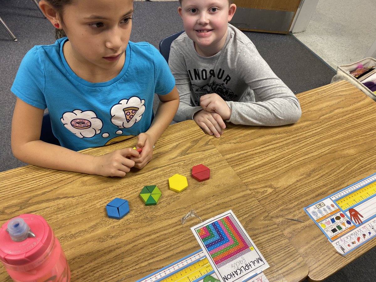 Working with our new math partners to explore ways to combine and subdivide polygons using manipulatives!