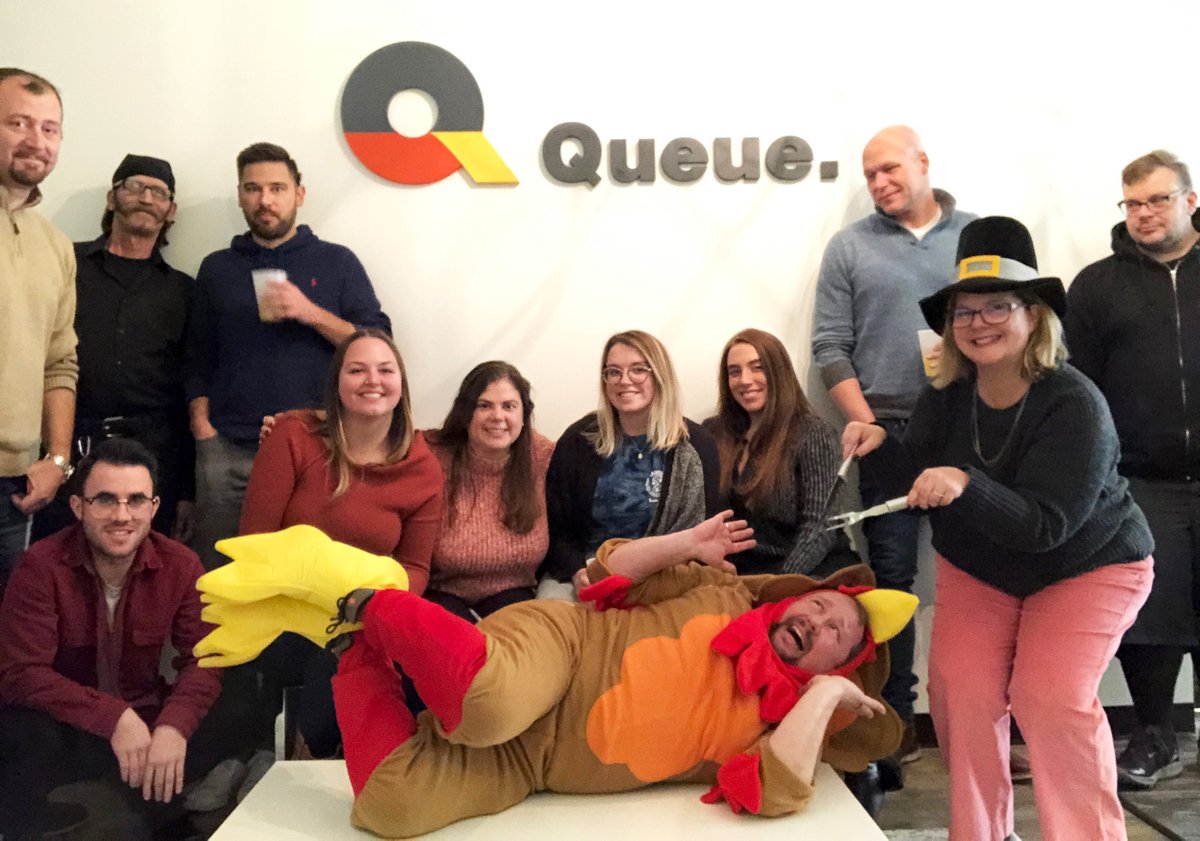 QueueChicago's tweet photo. Queue’s always ahead of the game, and that apparently includes holiday celebrations—we’re doing #Thanksgiving early this year! Our #potluck was a huge success, and we’re #thankful for everyone that makes Queue so great. From all of us at Queue: #HappyThanksgiving! https://t.co/E0mUUje4LJ