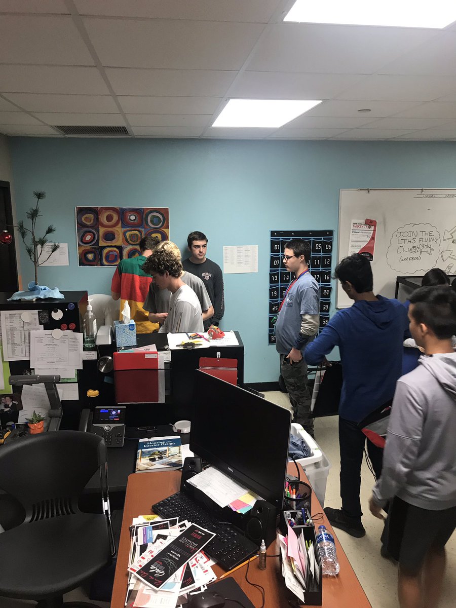 DECA stuffing goodie bags for the LTEF 5k Turkey Trot.