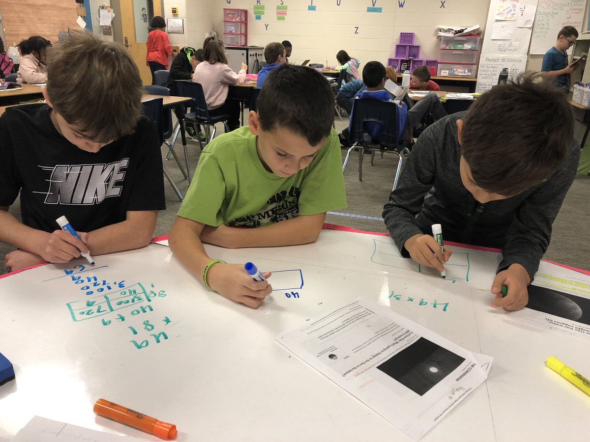 KrystiBlocker's tweet photo. Nothing makes this teacher heart happier than these three boys choosing to do extra multiplication practice at the whiteboard table. Direct quote: “this is fun!” ❤️ #panthersengaged #whiteboardtable  #iteachmath https://t.co/Dl9M4rk89r