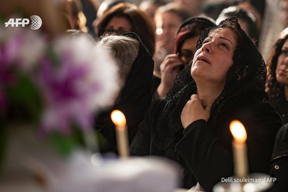 Mourners attend the funeral procession of a fighter from the #Syriac Military Council (SMC), a small minority of #Christian fighters fighting alongside the Syrian Democratic Forces (#SDF), in the northwestern Syrian city of Hasakah on November 22, 2019,  
<a href="/Delilsouleman/">Delil souleiman</a> / #AFP