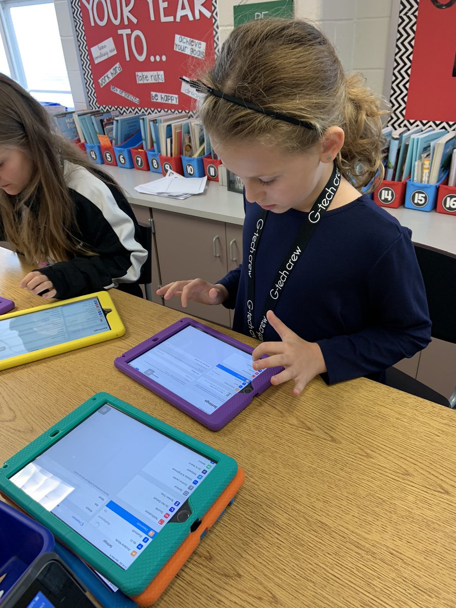 G-Tech Crew Members hard at work organizing log in cards for the QUEST Room and adjusting iPad settings for Apple Classroom! #cbsdtech #gtech 📱👍