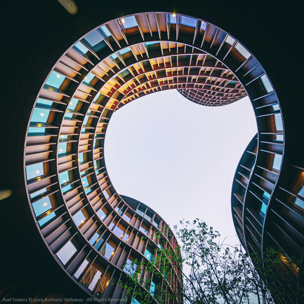 aj_h's tweet photo. A view looking up the Axel Towers in Copenhagen shortly before sunset. Click for the full image - https://t.co/46sMEVwIr1 #AxelTowers #Copenhagen #architecture #architecturephotography https://t.co/84cQNOQoY8
