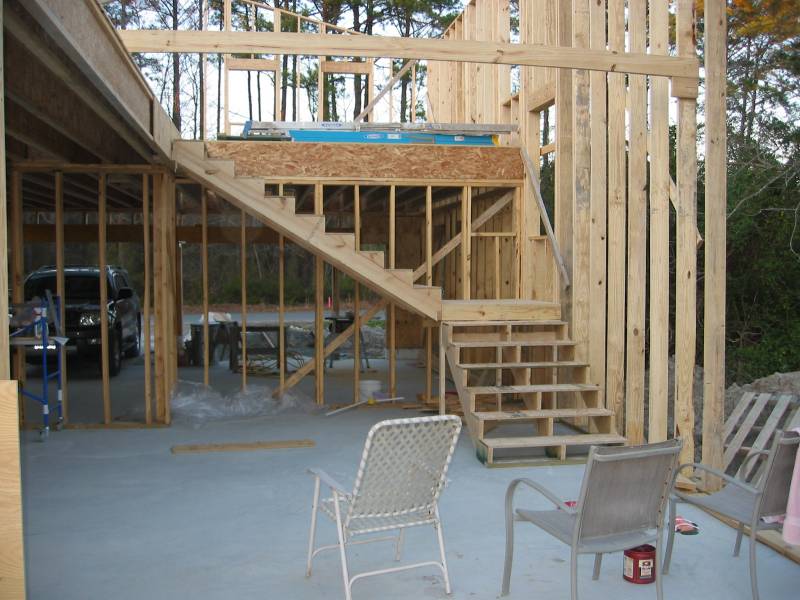 Imagine it. Grover and Friends sitting on those chairs, downing beers while discussing the genius of those stairs, and whether or not it& #39;s a good idea to start parking your car in the garage while you& #39;re still building it