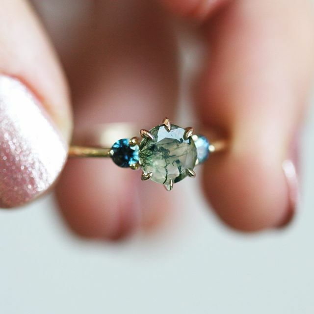 PrimozMajeric's tweet photo. Meet Taia - made with moss agate and teal sapphires this ring is taking us right into the Amazonian rainforest with the spectacular hues. 🧚🏽‍♂️🦎 Tap for details💫 https://t.co/pprS9vOaxN https://t.co/bzvZwFH9NG