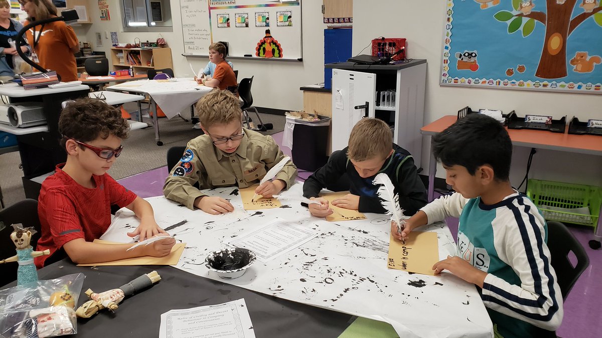 ShellyReh's tweet photo. Here are Akin's 5th graders trying to write with quills! https://t.co/YiEYgjT6de