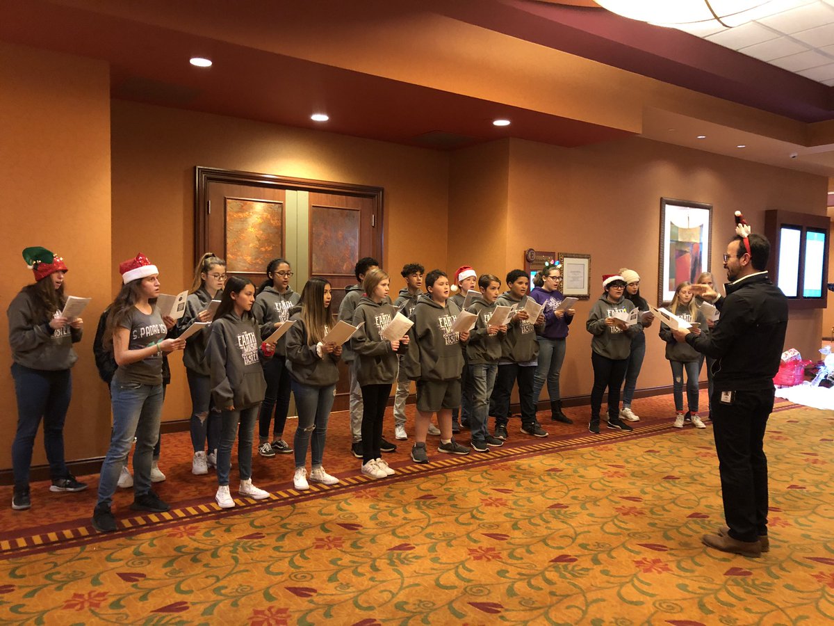 ChoirMiller's tweet photo. Did some caroling with these Singing Miller Rattlers!  Thank you to the Texas Market Guide for inviting us to sing at their Christmas Event.  We are definitely getting in the spirit!  Thank you students for your commitment to our program! @duvall58 @SMCISD_Comm https://t.co/M87DprF8hu