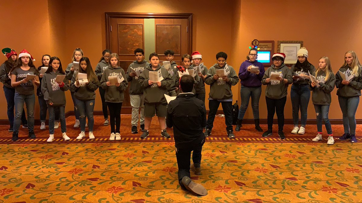 ChoirMiller's tweet photo. Did some caroling with these Singing Miller Rattlers!  Thank you to the Texas Market Guide for inviting us to sing at their Christmas Event.  We are definitely getting in the spirit!  Thank you students for your commitment to our program! @duvall58 @SMCISD_Comm https://t.co/M87DprF8hu