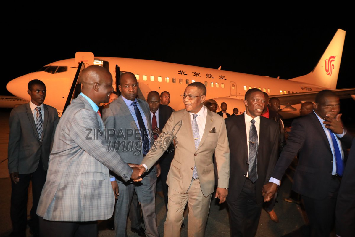 ZimpapersI's tweet photo. Vice President Constantino Chiwenga speaks to China's Deputy Ambassador to Zimbabwe, Mr Zhao Baogang upon his arrival at RG Mugabe Inter Airport this morning, Nov 23, 2019.-(Pics by Tawanda Mudimu)
@HeraldZimbabwe @SundayMailZim @williamchikoto 
@ZTNnews @SundayNewsZimba https://t.co/nXSCTwUuHS