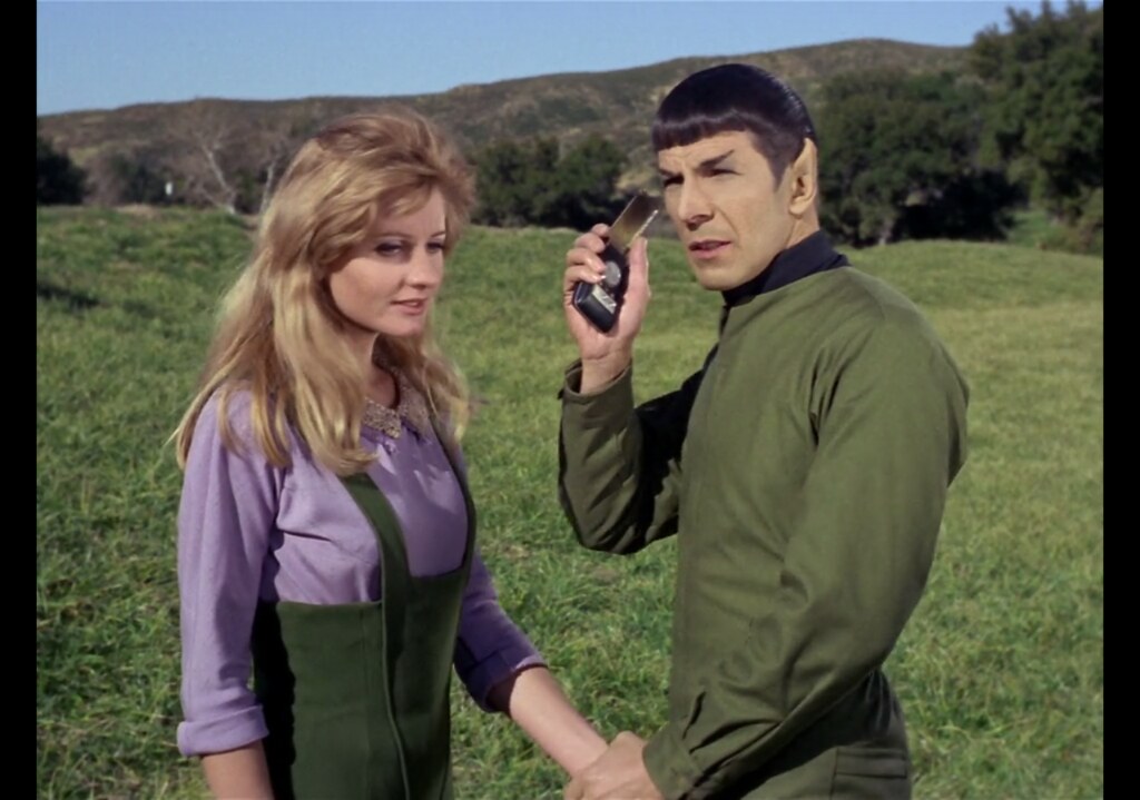 Outside of the quasi-military Star Fleet, we meet many in the Federation who have foregone fashion for function and selected some form of coverall.Jill Ireland still pulls off looking lovely.