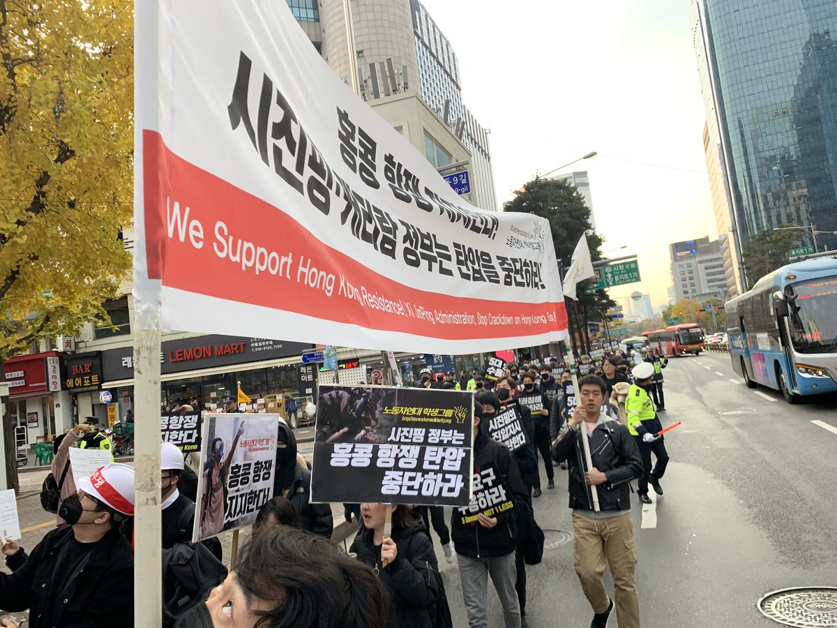 Protester says “our Gwangju democracy movement had the help of the international society, it’s now Korea’s turn to help.”