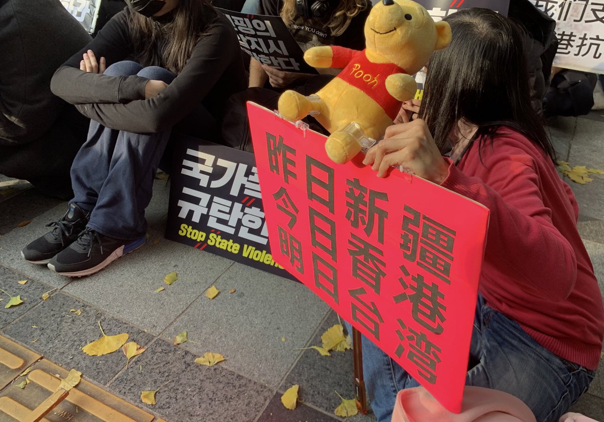 Protester says “our Gwangju democracy movement had the help of the international society, it’s now Korea’s turn to help.”