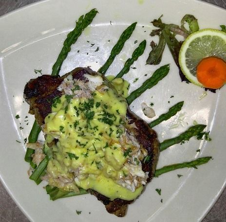 Mouth watering Dinner Specials at The Sunset Tavern this week.
 Steak Oscar - 12 oz New York strip steak cooked to your liking. Topped with crab meat &amp; served with Bearnaise sauce over asparagus &amp; mashed potato.