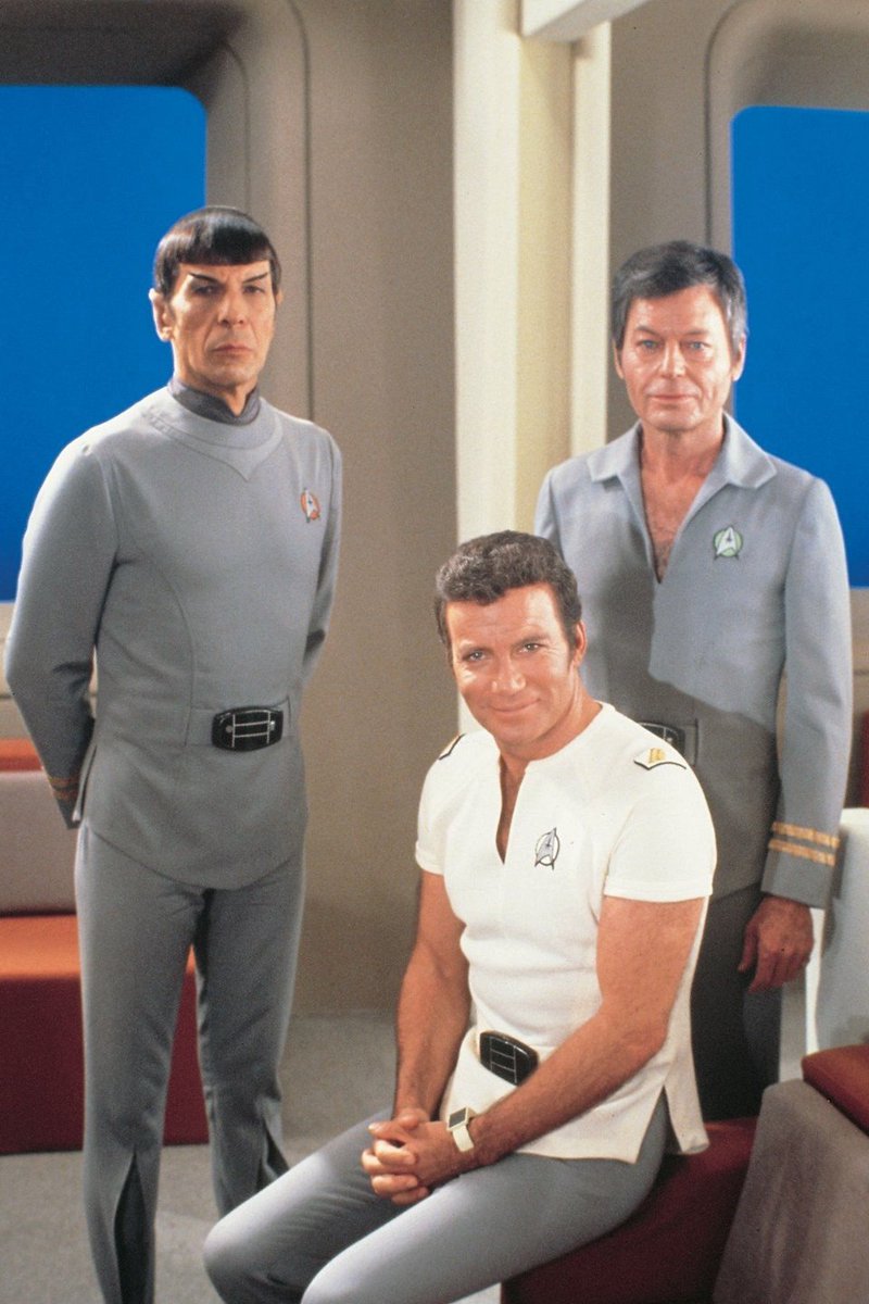 Kirk in the white short sleeved shirt looks quite good, I think. The bland monotonic jump suits don't do anything for me, and the focal point belt buckle is a glaring issue. Its drab and overly utilitarian, and given the aging actors, makes a poor statement on aging.