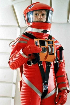 And for fun, here is the realistic space suit from 2001 A Space Odyssey, and on the opposite end, the fashion forward uniform and purple wig of U.F.O.s moonbase crew.