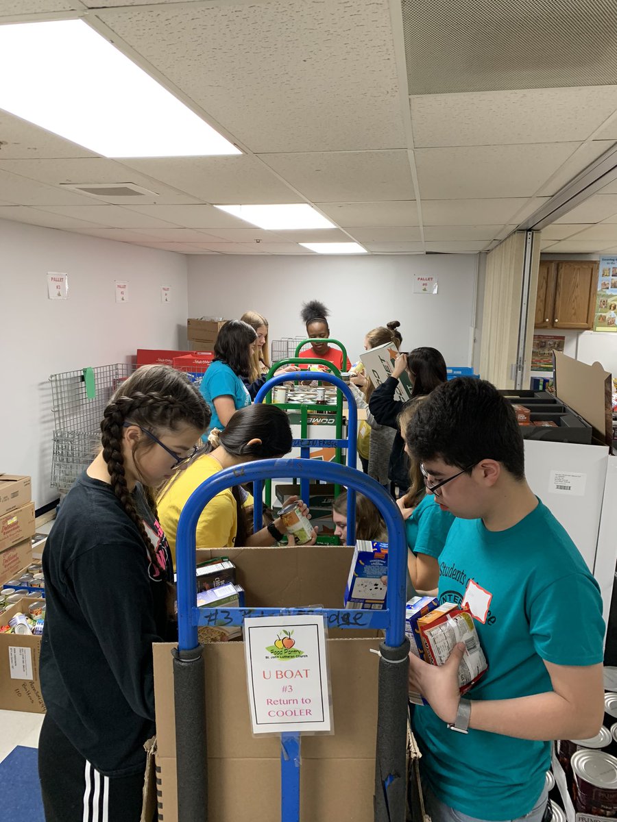 Student Of Service helped out today at St. John Food Pantry this morning with sorting foods and helping the customers.