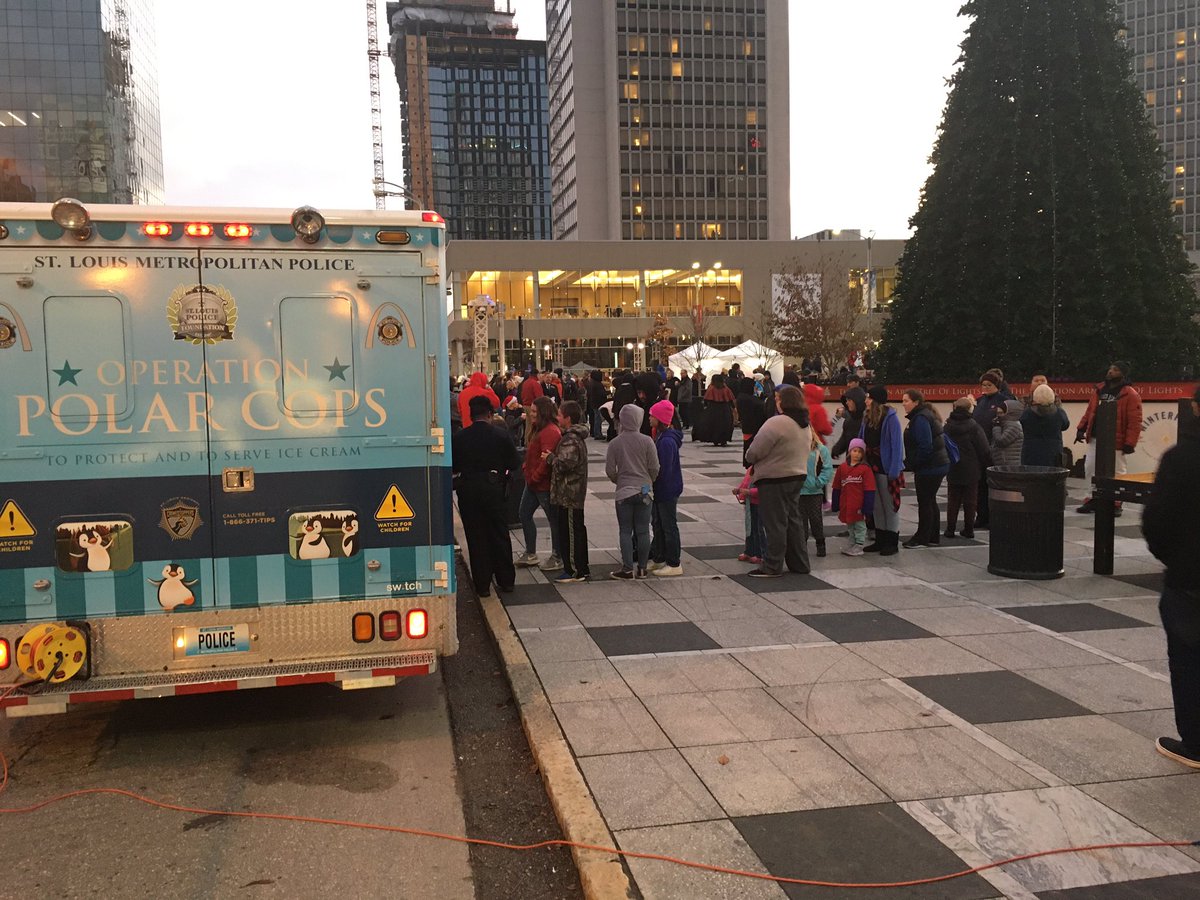 SLMPD's tweet photo. #STLPolarCops has arrived to serve frozen treats @AmerenMissouri Festival of Lights๐ which officially ushers in the Holiday Season with the lighting of the Salvation Army Tree of Lights in Kiener Plaza Park. ๐จ๐๐ฆ๐ https://t.co/G7bs3rg9sS