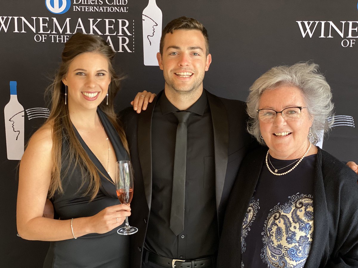 KarlLambour's tweet photo. Our @TOKARAestate nominee for #youngWinemaker Tim Whitfield with his beautiful partner Kirsten de Wet and the stunning Carrie Adams @CarrieNGF, one of the esteemed judges of the prestigious #DCWinemaker of the year challenge. An evening to remember. #indelible https://t.co/X5v3rZbbjn