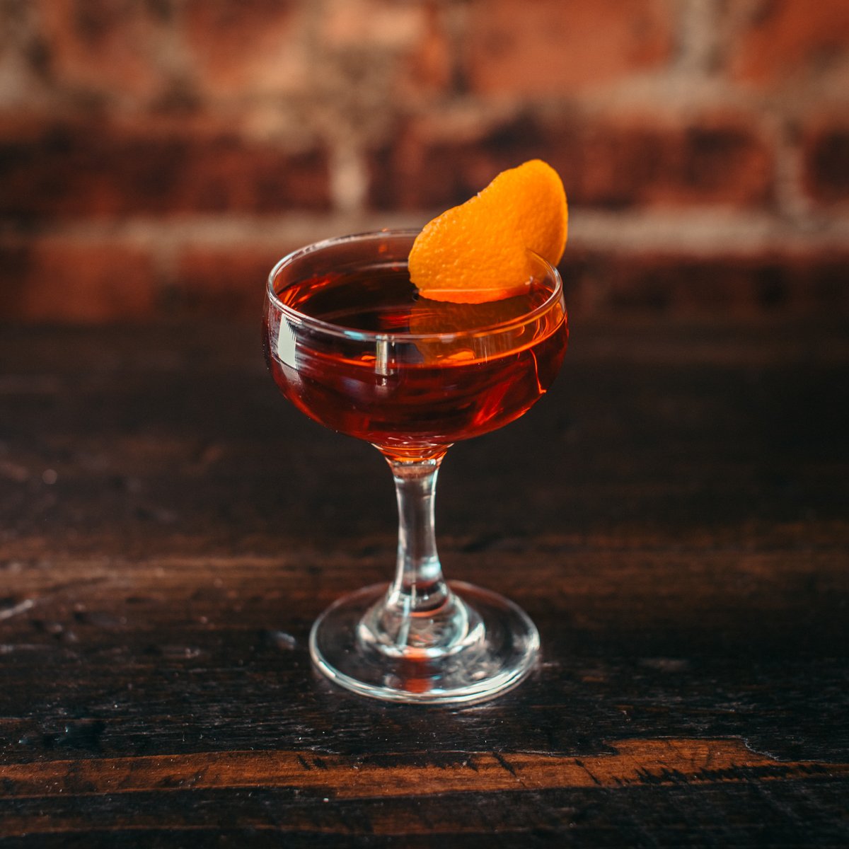 The #Negroni cocktail was invented circa 1919 in Florence, Italy. It's a classic cocktail made of equal parts gin, Campari and sweet vermouth. For this version, we added mezcal! 🥃 🍊🍹