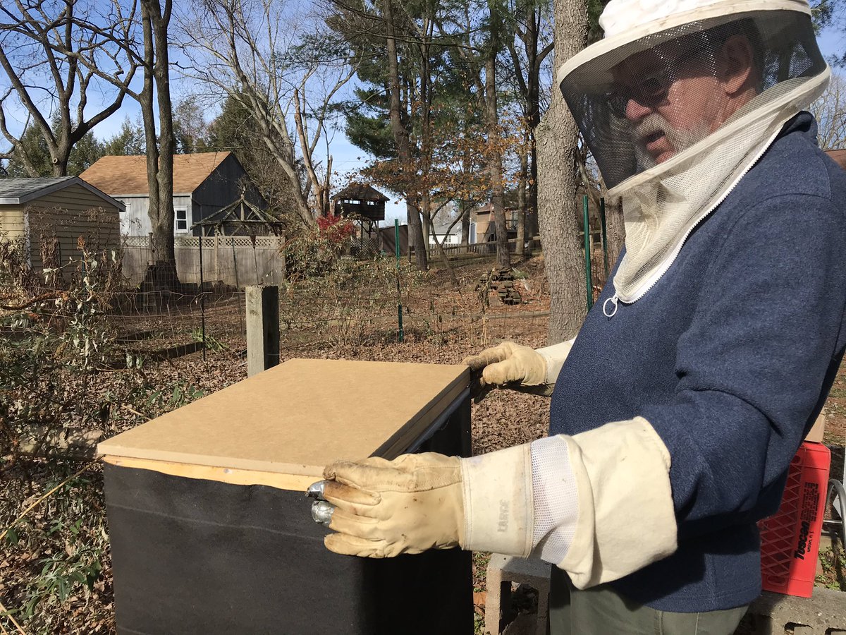 BugGuy5's tweet photo. Finished winterizing beehives today. Added winter food patties high in carbohydrates to supplement honey reserves. To help protect bees from cold weather, hives were wrapped with tar paper.  Moisture boards were placed inside to capture condensation buildup that occurs in winter. https://t.co/PG6JCroJcM