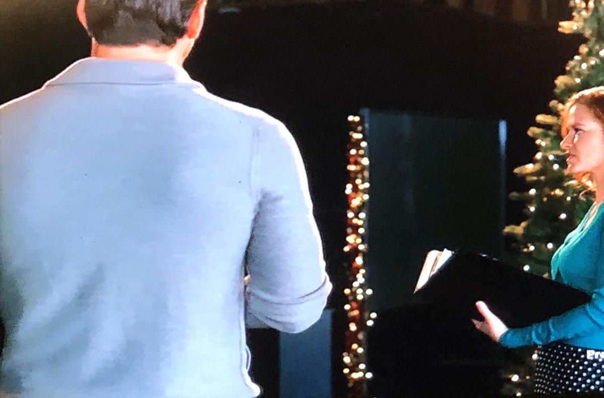 Knowing to shoot this cardigan from multiple angles.   #TwinkleAllTheWay  #SexyChristmasSweaters