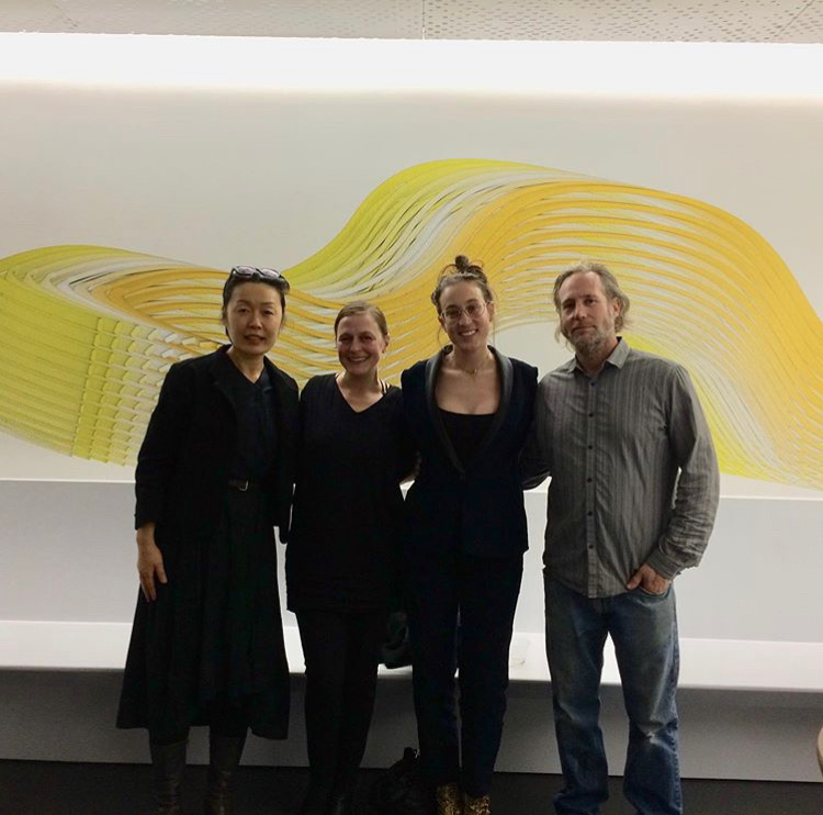 Congratulations to everyone who made the grand opening of the Kaiser Sports Medicine Clinic a success! Pictured from left to right: Lead designer Mary Wang, our own Ginny Tominia, Meryl Pataky, and Randy Colosky in front of his work.