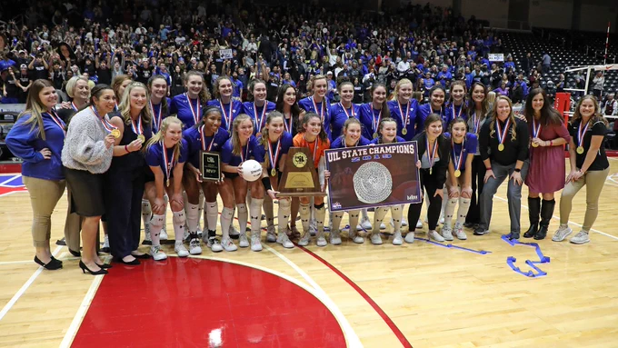 The Byron Nelson Bobcats pose with the title trophy.