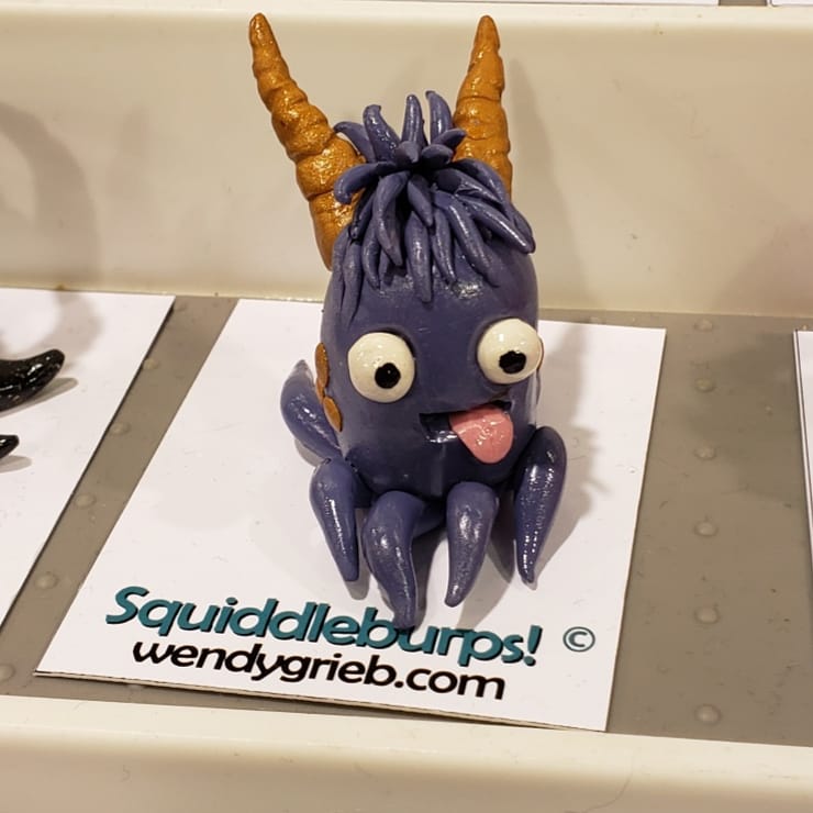 wendy_grieb's tweet photo. Some of my Squiddleburps I am selling here at Designer Con! Booth #2307! #monster #squiddleburps #polymerclay #sculpture #fantasy #originalart #cute https://t.co/ysEAU3TfzK