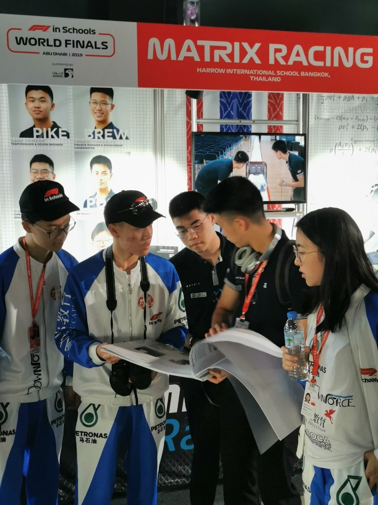 MatrixRacingTH's tweet photo. Matrix Racing have a busy schedule today: presentations on the Design and Engineering of our car, judges scrutineering feedback and our first competitive race. But first, time to meet new friends and discuss our #STEM  journey and engineering portfolios. @harrowbangkok #yaswecan https://t.co/ptrHw9bRUz
