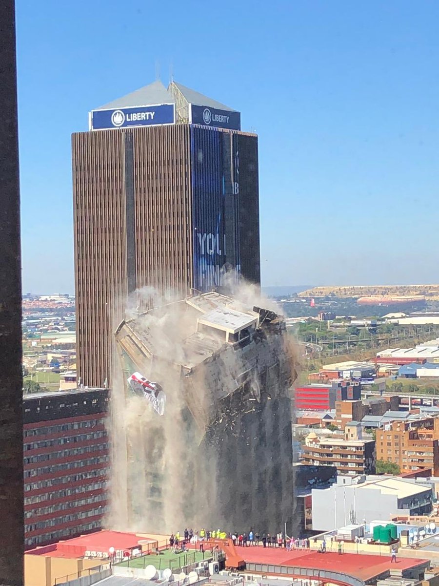 ngageeveryone's tweet photo. Before, during and after the dust had settled at the site where the #BankofLisbon building once stood https://t.co/VaWLa2uIFU