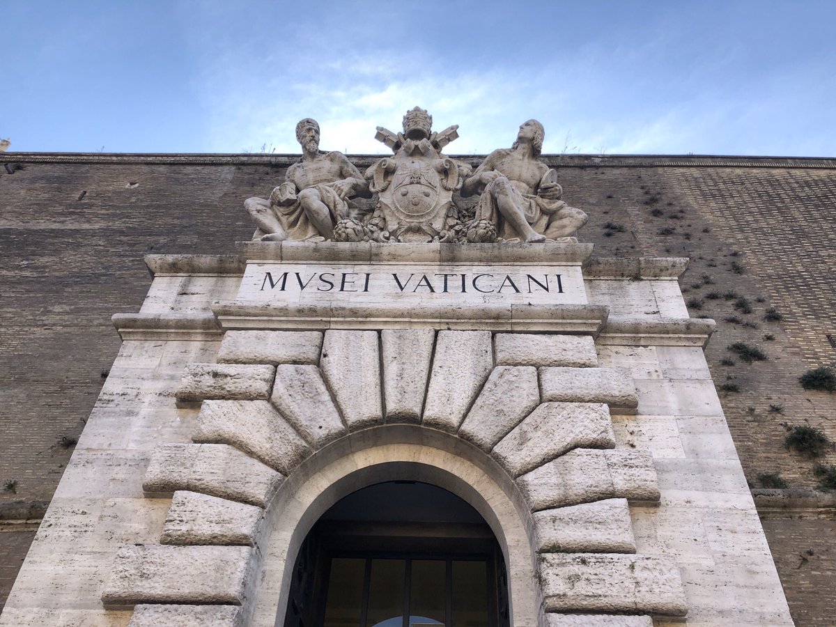 The doorway I’ve exited from The Vatican Museum. It displays a carved sign that says “MUSEI VATICANI” (which is Italian for “Vatican Museums”), followed by the sculptures of the 2 legendary artists, being Michelangelo (the left) & Raphael (the right). A very admirable closure.