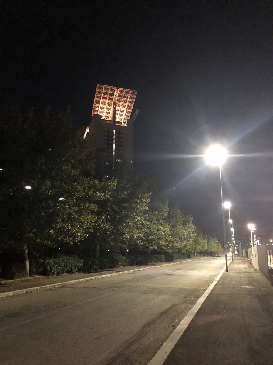 The photo I’ve took upon beginning to traverse the night hours & visiting the Euroma 2 shopping mall one last time in Rome. Within this photo, you can see many lights that brilliantly shine under the night sky, & the wonderful path I’ve embarked on during the same day.