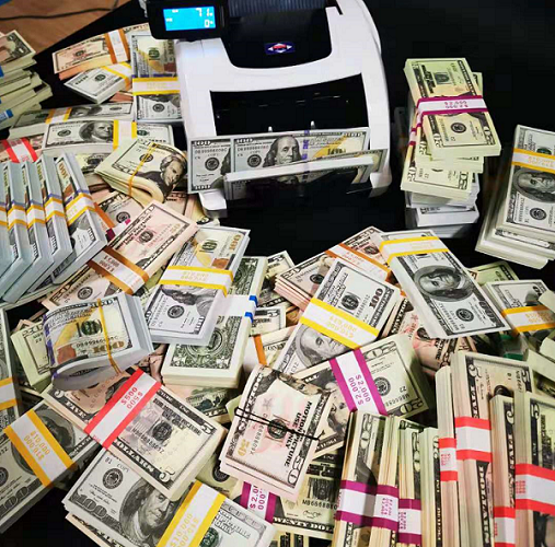 All toy money is made by paper according to international law.
playmoviemoney.com