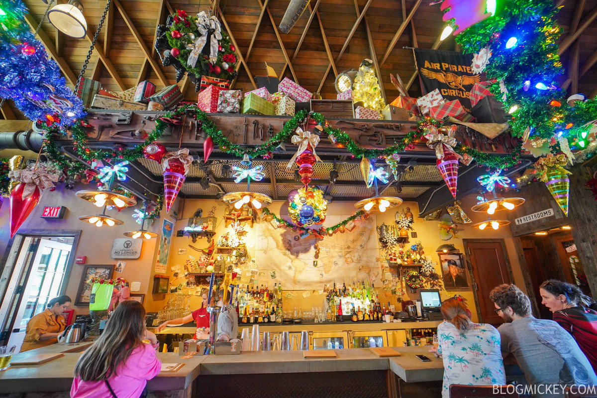 Blog_Mickey's tweet photo. FIRST LOOK! Jock Lindsey’s Hangar Bar Holiday Overlay and Decor Debuts at Disney Springs 

All photos: https://t.co/lrZPJNrUkI https://t.co/vbk8ykUmew