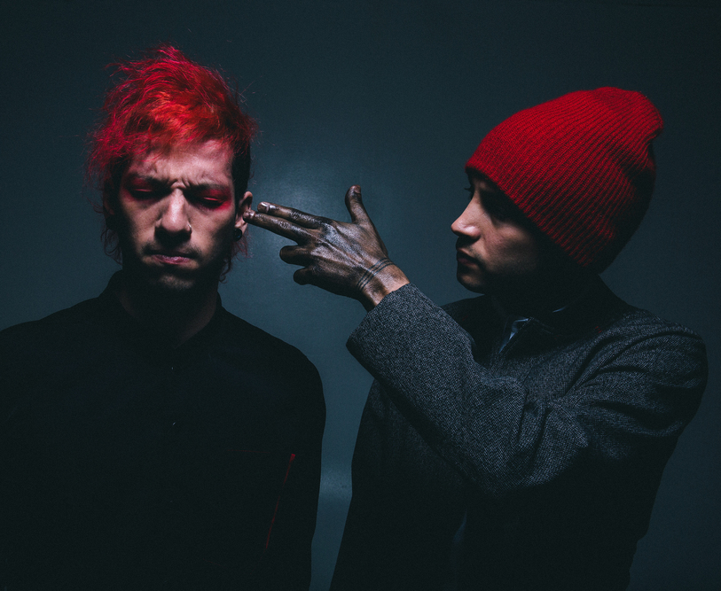 - 2014 saw a lot of imagery like this, with the "metaphorical blast" intro to the quiet is violent tour. by the end of the blurryface album, we are to understand shooting him didn't work ("i need your help to take him out".)