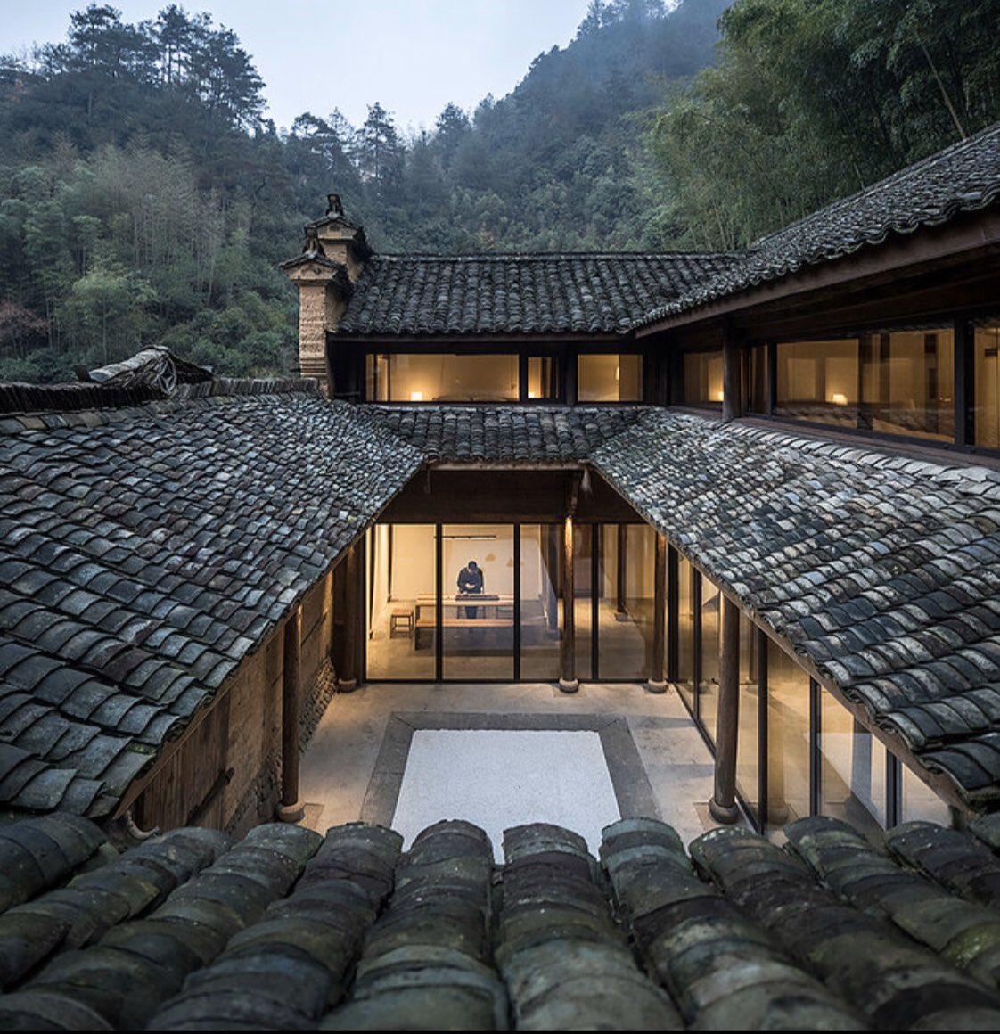 When you see this level of  #enerPHit design excellence of an historic Chinese courtyard home, you know the kids are all right!  #iphc23 (Check out their website for more mouthwatering images:  https://www.hxp-architekten.com/1 )  #rammedearth