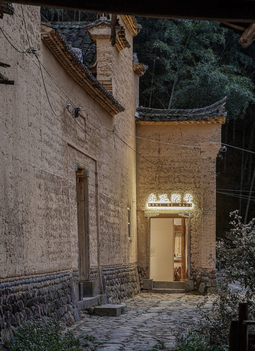 When you see this level of  #enerPHit design excellence of an historic Chinese courtyard home, you know the kids are all right!  #iphc23 (Check out their website for more mouthwatering images:  https://www.hxp-architekten.com/1 )  #rammedearth