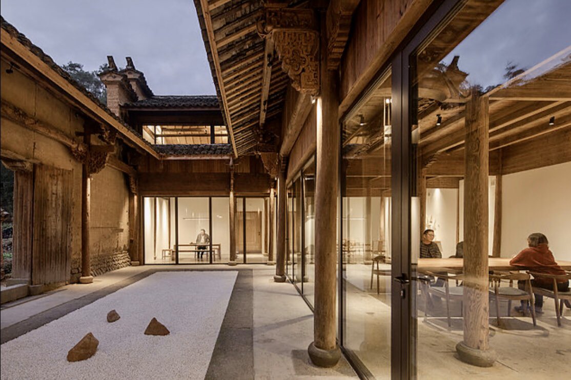 When you see this level of  #enerPHit design excellence of an historic Chinese courtyard home, you know the kids are all right!  #iphc23 (Check out their website for more mouthwatering images:  https://www.hxp-architekten.com/1 )  #rammedearth