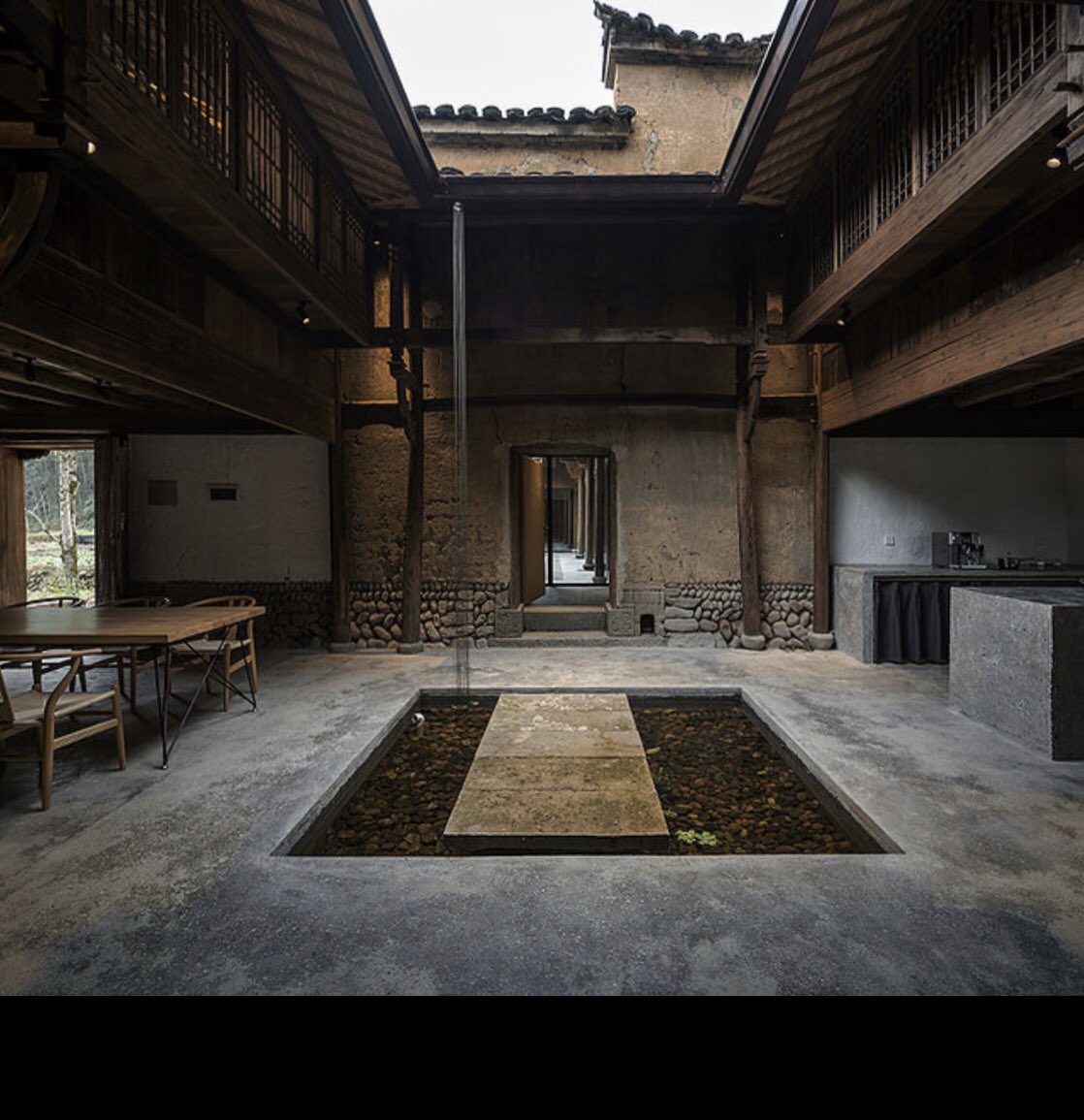 When you see this level of  #enerPHit design excellence of an historic Chinese courtyard home, you know the kids are all right!  #iphc23 (Check out their website for more mouthwatering images:  https://www.hxp-architekten.com/1 )  #rammedearth