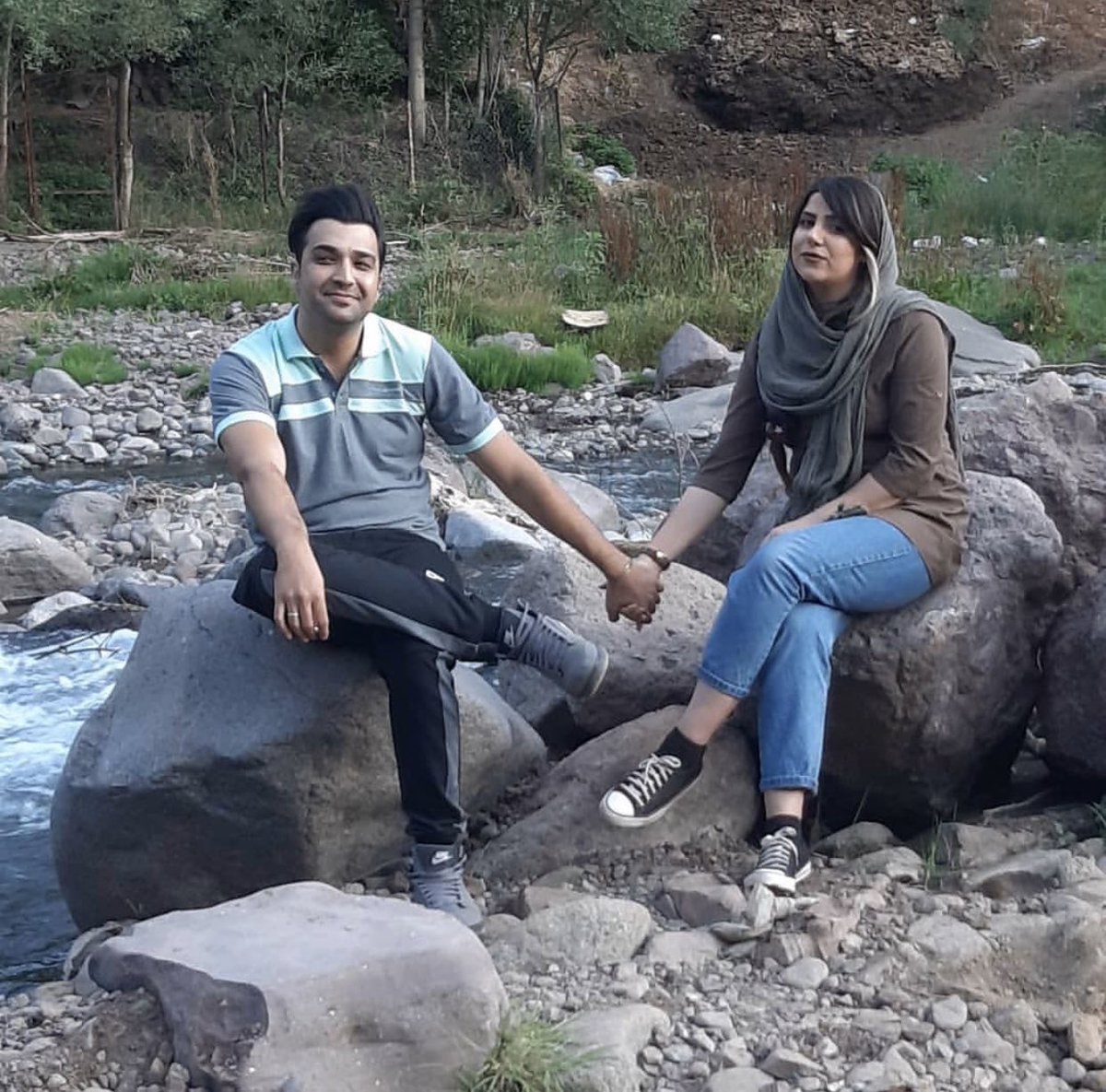 Hamid Rasouli, next to his wife. He was killed by two bullets in Golshahr, Karaj by Khamenei’s mercenaries during the  #IranProtests. Bless your soul and path. Rest in power 