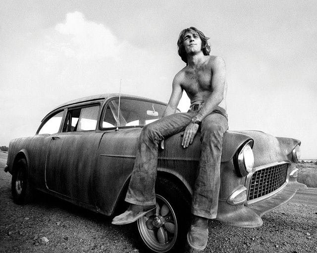 SpacewomanR's tweet photo. Beach Boys drummer Dennis Wilson as 'The Mechanic' in the film "Two-Lane Blacktop" in 1971. 🎥 🚘 https://t.co/G7yUzNKrQX