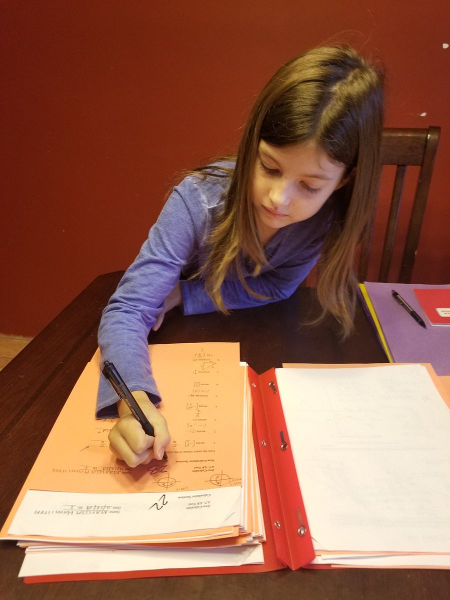 Teacher in training!  Plus she's practicing her addition skills 🙂