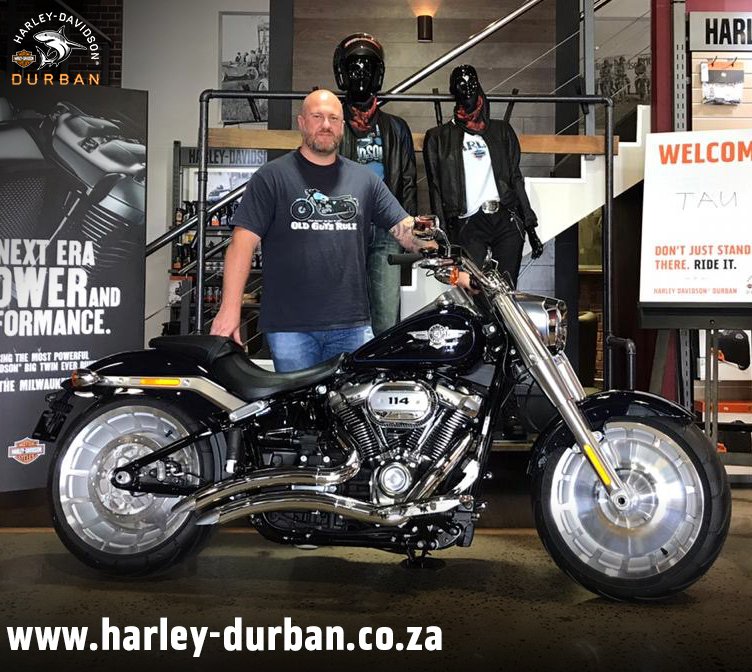 HD_Durban's tweet photo. Travis is tearing up the tar on his new Fat Boy® which has been customised with Vance &amp; Hines Big Radius pipes! A massive thank you, Travis, for your continued support (9th bike from us!). Ride safe and enjoy every moment on your new bike. #Durban #biker #harleydavidson https://t.co/gkM4JDvXqL