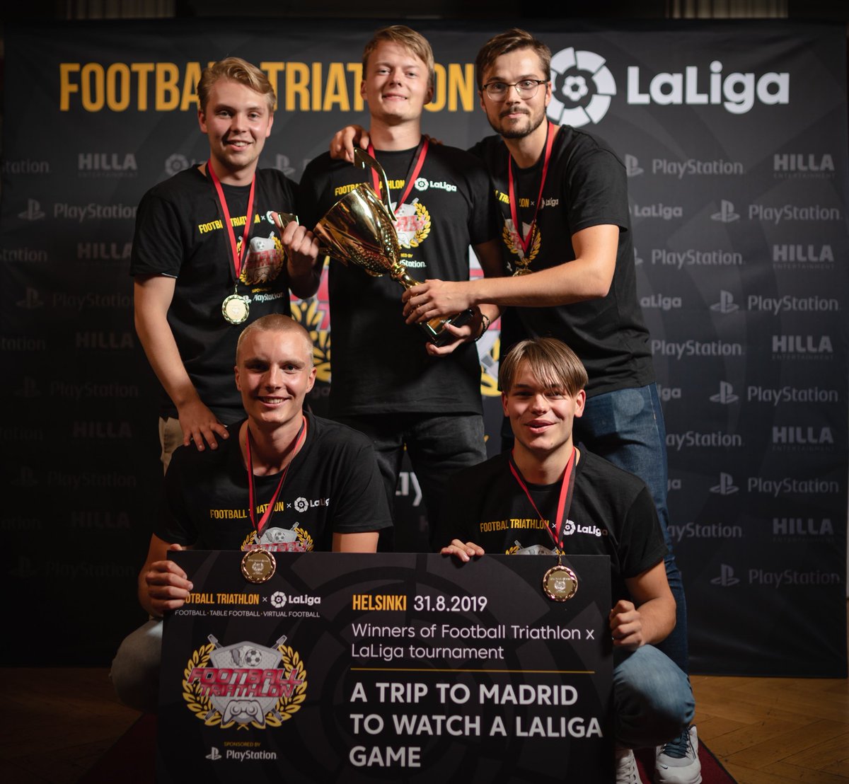 FootballTWC's tweet photo. Football Triathlon x LaLiga winner team (RCD Espanyol / Aaro edari) had fun this weekend in Madrid with their main price🏆🥇 watching @LaLiga game (#RealMadrid vs #RealSociedad). 🇪🇸 Congratulations! #FOOTBALLTRIATHLON #Laliga #PlayStation #HILLAEntertainment #footballculture https://t.co/Drc0kY4Jq0